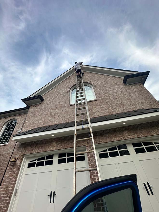 Professional exterior painting on a residential home
